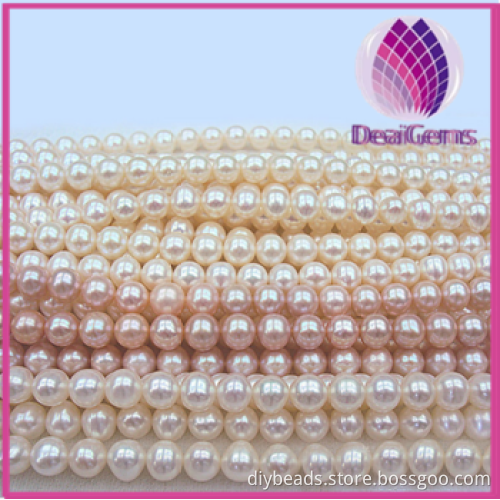 Natural freshwater pearl white / peach / mauve 7-8mm round,A+ grade.